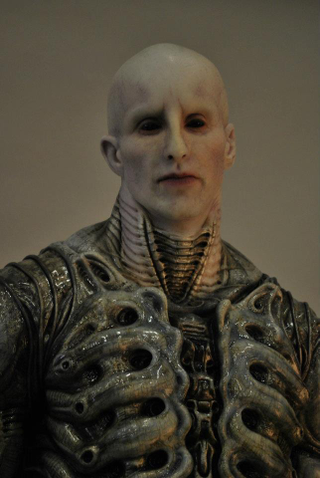 Illustration for article titled Prometheus set photos show what's under the Engineers' robes, plus a never-before-seen character
